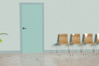 Waiting room of a dental office with chairs, door and plant