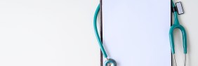 Clipboard with turquoise stethoscope