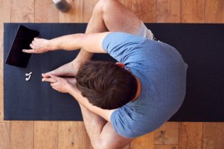 occupational therapist on yoga mat