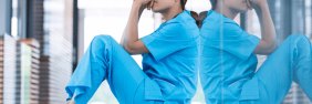 woman sitting thinking about negligence in nursing