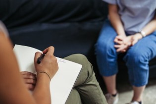 A therapist recognizing the signs that it may be time to break patient confidentiality to avoid harm